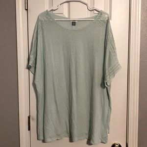 Green sheer short sleeve shirt.